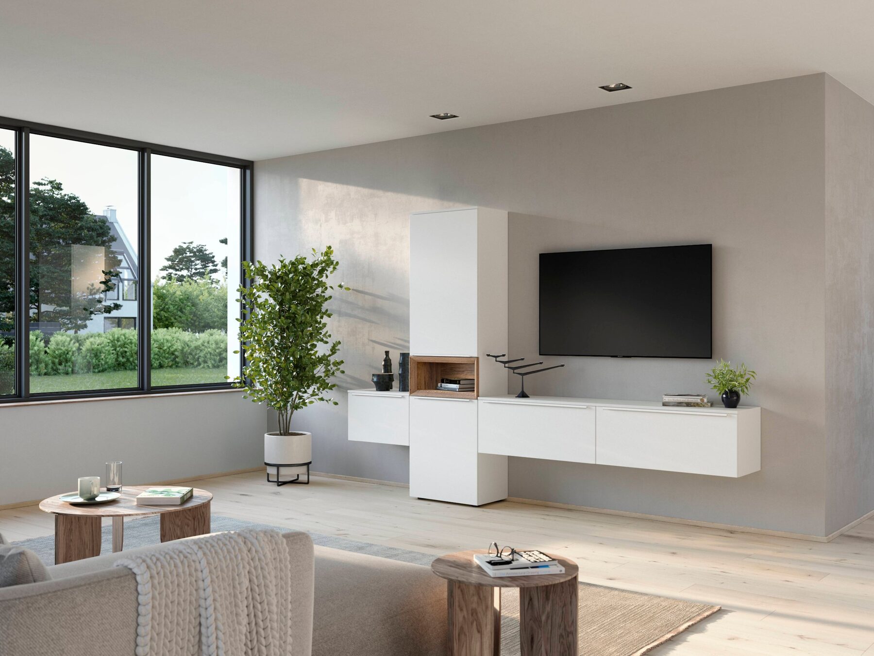 Minimalistische weiße TV-Wand mit rundem Beistelltisch